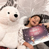 Cadeau idéal pour un enfant : un livre personnalisé de Noël.